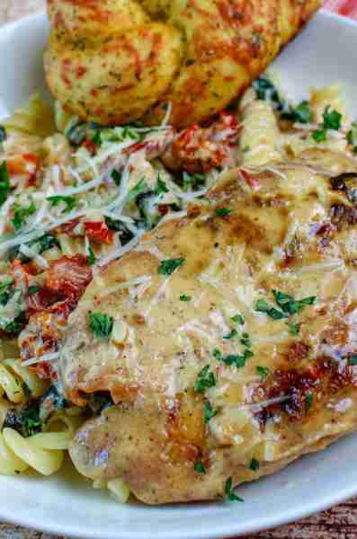 Tender, juicy chicken breasts smothered in a cream sauce filled with the robust flavor of garlic, su...