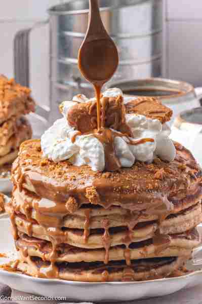 BISCOFF PANCAKES! 🥞 Fluffy, golden Biscoff Pancakes with cookie butter, whipped cream, and cookies...