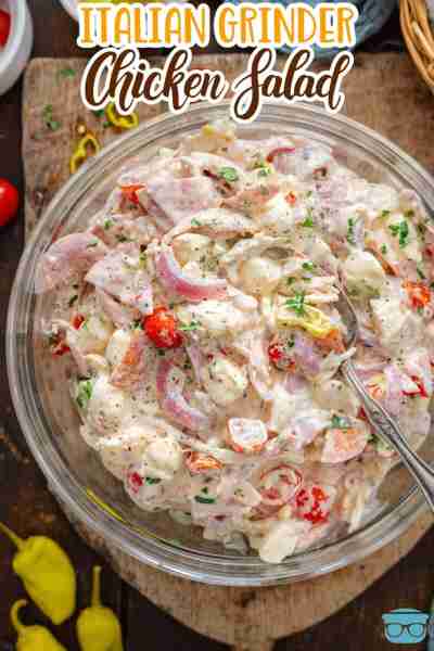This recipe for Italian Grinder Chicken Salad is loaded with tender shredded chicken, deli meats, to...