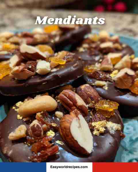 🍫 Mendiants Chocolate discs topped with dried fruits and nuts 🌰🍊. Ingredients: • 200 g dark choco...