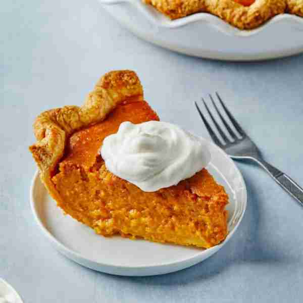 Sweet Potato Pie - A classic pie recipe filled with indulgent fall flavors and spices in a flaky but...