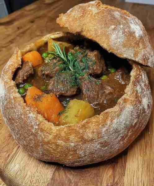 "My mom's Beef Stew in a Bread Bowl is a family favorite. She pours her love into every spoonful, ma...