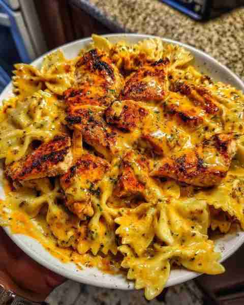 Creamy Cajun Chicken Bowtie Pasta 🍝🔥 Recipe: Ingredients: 2 chicken breasts (seasoned with Cajun s...