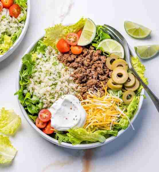 Taco Salad with Cilantro Lime Cauliflower Rice is a satisfying dinner idea for the whole family, OR...