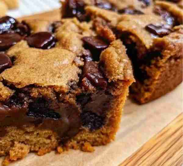 Peanut Butter Chocolate Chip Bars Ingredients: 1/2 cup (1 stick) unsalted butter, melted 1/2 cup cre...