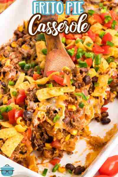 Frito Pie Casserole is made with layers of seasoned ground beef, salsa, and black beans, topped with...