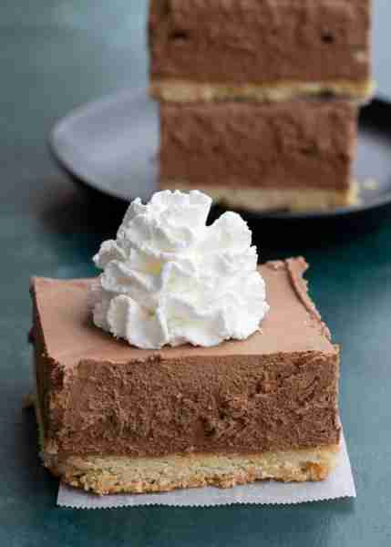These keto-friendly Chocolate Pie Bars feature a shortbread cookie crust with an ultra-creamy, fluff...