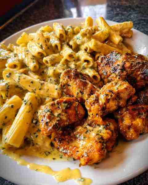 Cheesy Cajun Chicken Penne in Creamy Garlic Velveeta Parmesan Sauce Ingredients: 1½ lbs boneless, sk...