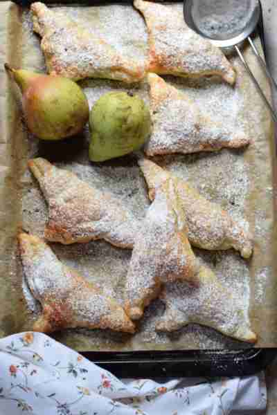 If you love apple turnovers, you might like to try out these seasonal Pear Turnovers. I diced up pea...