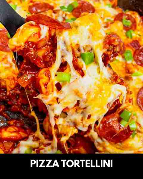 Pizza Tortellini is a hearty pasta dish loaded with Italian sausage meat, cheese tortellini, diced o...