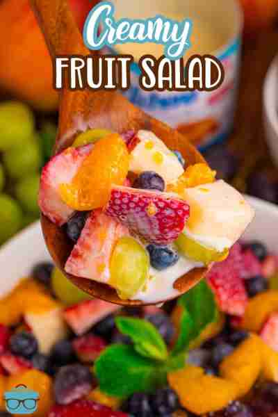 Creamy Fruit Salad comes together fast and is made with strawberries, blueberries, grapes, mandarin...