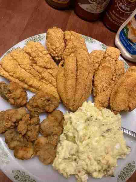 Nothing fancy just catfish and fried oysters with potatoe salad in Mississippi